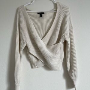 Knit cream wrap over sweater